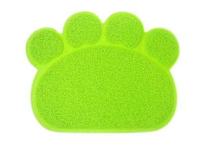 Detailed texture of green paw-shaped PVC cat litter mat with non-slip loop wire