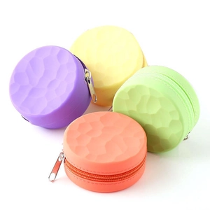Set of colorful round silicone mini purses with honeycomb texture and zipper closure