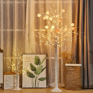 Decorative LED birch tree lights with warm white beads and cotton ball ornaments