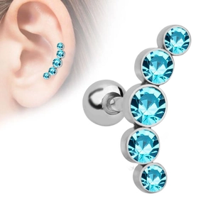 Macro detail of stainless steel earrings with five gradient blue cubic zirconia stones