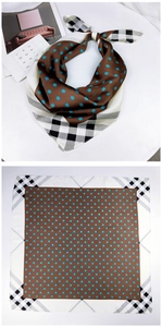 Detailed view of square silk scarf with brown polka dots and black white check borders