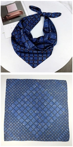 Flat lay and knotted view of dark blue silk scarf with black grid and orange polka dots