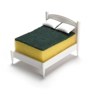 Creative kitchen sponge holder shaped like a miniature white bed with sponge mattress