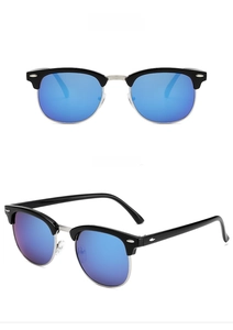 Close-up of retro semi-rimless sunglasses with black silver frame and blue coated lenses