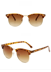 Retro semi-rimless sunglasses in tortoiseshell resin and gold metal with brown gradient lenses