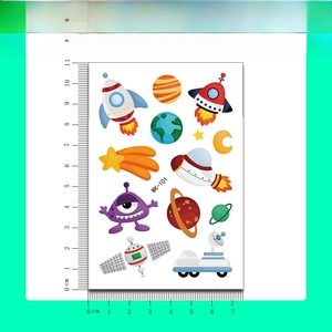 Close-up of space rocket and astronaut temporary tattoo stickers measuring 7x11cm