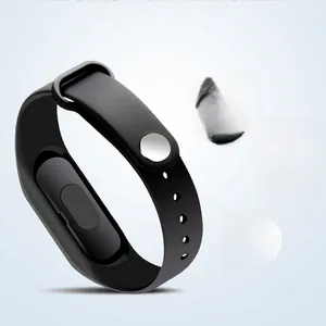 Detail view of black silicone replacement strap with metal buckle and adjustment holes