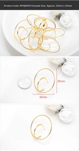 Detail view of 35mm gold circular multi-loop earrings showing dimensions and stacked design
