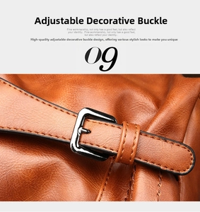 Detail of adjustable metal buckle on caramel leather Boston bag with pebble grain texture