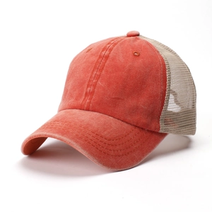 Vintage orange washed cotton trucker hat with breathable beige mesh and curved brim
