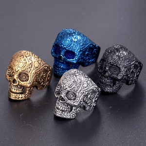 Vintage titanium steel skull rings with floral engraving in gold, blue, silver, and black