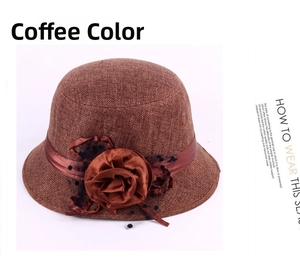 Detailansicht eines Kaffeebraunen Leinen-Glockenhuts mit Stoffblume und Punktnetz