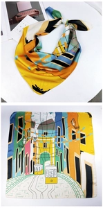 Detail view of square silk scarf showing European street print with yellow tram design