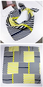 Navy and yellow geometric striped silk scarf with detailed knot and flat layout