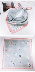 Detail of French style silk scarf with pink borders and hand-drawn floral graffiti pattern