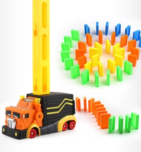 Macro shot of an automatic domino laying truck toy with colorful tiles and loading cartridge