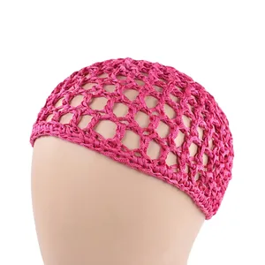 Detail of rose pink hand-crocheted hair net snood with mesh bow on a mannequin head