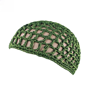 Detail of dark green hand-crocheted mesh hairnet with bow and coarse rope texture