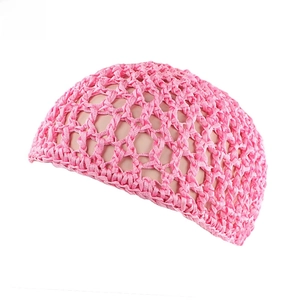 Detailed texture of pink handmade crochet hair net with breathable honeycomb weave pattern