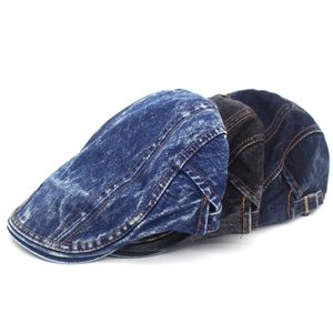 Close-up of vintage washed denim caps with metallic buckle and soft cotton texture