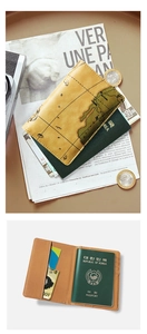 Detailed interior of vintage map passport holder with multiple card slots and cash pocket
