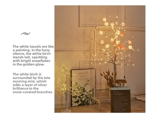 Detail of warm white LED birch tree lamp showing realistic bark texture and glowing spheres