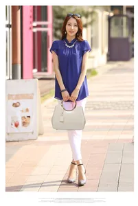 Detailed view of the dark blue chiffon blouse featuring elegant pleated collar and cap sleeves