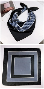 Detailed pattern of black silk scarf with white geometric polka dots and border