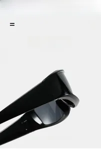 Detail of streamlined outdoor sports sunglasses showing hinge craft and elastic frame