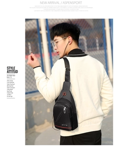 Detail of waterproof Oxford fabric chest bag with headphone port and multi-zipper pockets