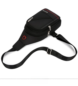 Detail view of black oxford fabric sling bag showing sport logo and headphone jack