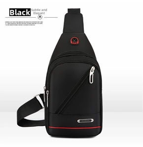 Detailed view of black waterproof oxford chest bag with red trim and silver zippers