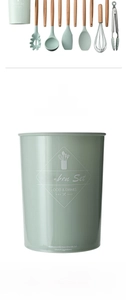 Detail of mint green silicone cooking tools with wooden handles in a storage bucket