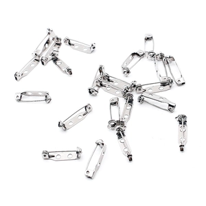 Close-up of stainless steel safety pins with security locks for DIY brooch jewelry making