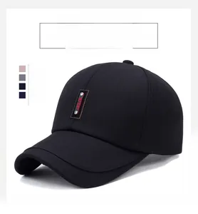 Detail view of cotton baseball cap with red SPORT embroidery, available in 4 colors