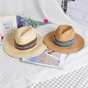 Men and women ethnic style straw fedora hats with woven bands for summer beach vacations