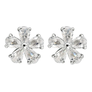 Detailed macro view of silver flower stud earrings with pear-shaped zircon petals