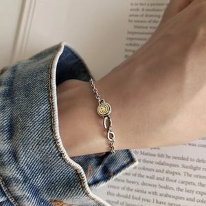 Vintage 925 sterling silver chain bracelet featuring a sun smiley face charm for women
