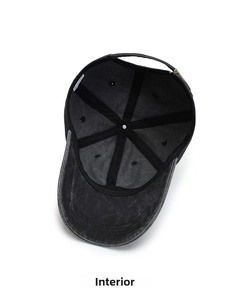 Detail view of the internal six-panel structure and reinforced seams of a washed cotton cap