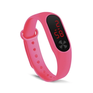 Detail view of pink silicone digital sports watch with red LED time display at 45-degree angle