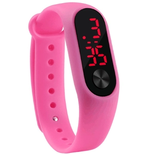 Macro shot of pink silicone sports band with red LED digital display showing time