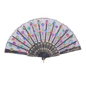 Gray sequin peacock folding fan with black frame and golden carved details on white background