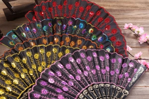 Detail of embroidered folding fans with sequins and ornate black gold-patterned ribs