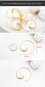 Detailed macro view of 32x33mm gold teardrop hoop earring components for DIY jewelry