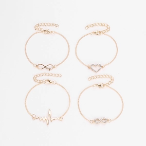 Set of 4 gold minimalist bracelets with heart, heartbeat, and infinity diamond accents