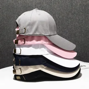 Minimalist cotton baseball caps in multiple colors with adjustable metal buckles