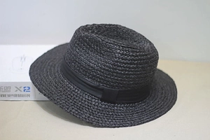 Women's black raffia fedora sun hat with matching silk ribbon for summer travel
