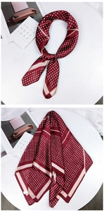 Detail of silk-like wine red square scarf with white polka dots and elegant border