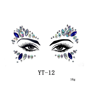 Macro shot of blue and iridescent rhinestone face jewels with teardrop and round gems