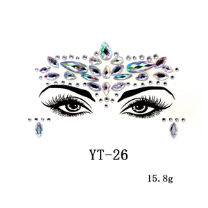 Detailed crown-shaped iridescent facial rhinestones and under-eye jewels for parties